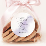 Watercolor Purple Thank You Wedding Favor Sticker<br><div class="desc">These watercolor purple thank you wedding favor stickers are perfect for a modern wedding reception. The simple and classic design features a splash of pastel lavender purple water color with minimalist elegant style. Personalize the sticker labels with your names, the event (if applicable), and the date. These stickers can be...</div>