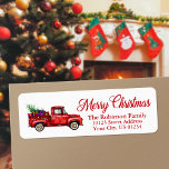 Watercolor Red Truck Christmas Return Address Label<br><div class="desc">A beautiful holiday return address label featuring modern calligraphy script Merry Christmas with a custom watercolor vintage red truck with string lights and filled with a tree and gifts for all.</div>