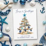 Watercolor Tree Seas and Greetings Beach Holiday Postcard<br><div class="desc">Modern Minimalist Elegance Calligraphy Ink Pen Handwritten Script Seas & Greetings Coastal Holiday Postcard includes a Watercolor Christmas Tree make of beach ocean driftwood,  seashells,  sand dollars,  nautical anchor ornament and topped with a starfish. Navy Blue Text.</div>