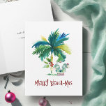 Watercolor Tropical Beach Folded Christmas Cards<br><div class="desc">These tropical beach folded Christmas cards feature an island-inspired exotic palm tree and cute holiday Santa. The words "Merry Beach-mas" are set in hand lettered type. The card opens to reveal a rich berry red color. Use the template fields to add your personalized greeting. A charming yet funny choice to...</div>