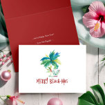 Watercolor Tropical Beach Folded Christmas Cards<br><div class="desc">Celebrate a tropical Florida holiday or send warm wishes from paradise with these beach Christmas cards featuring a whimsical Santa and exotic palm tree in vibrant watercolor. These coastal Christmas cards blend island charm and holiday cheer with the playful phrase "Merry Beach-mas" in hand-lettered typography. Perfect as a Hawaii Christmas...</div>