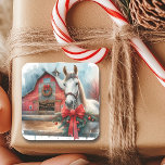 Watercolor White Horse and Festive Farm Christmas Square Sticker<br><div class="desc">Pretty farming themed country stickers.  Pretty white watercolor horse with a red bow around her neck. Background is a red rustic barn all decked out in Christmas decorations.</div>