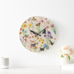Watercolor Wildflowers & Butterflies Floral Garden Large Clock<br><div class="desc">A beautiful watercolor design featuring wildflowers and butterflies. A colorful arrangement of wild flowers and butterflies in a floral garden. An ideal design for anyone who loves colorful butterflies,  watercolor florals,  wildflower illustrations and botanical themed art. Perfect seasonal home décor or gift for someone special.</div>