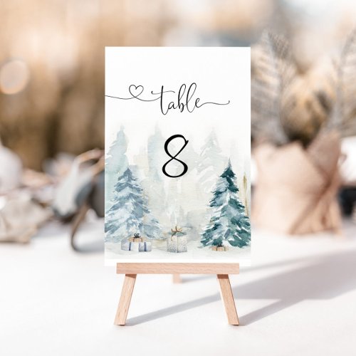 Watercolor winter pine trees table number