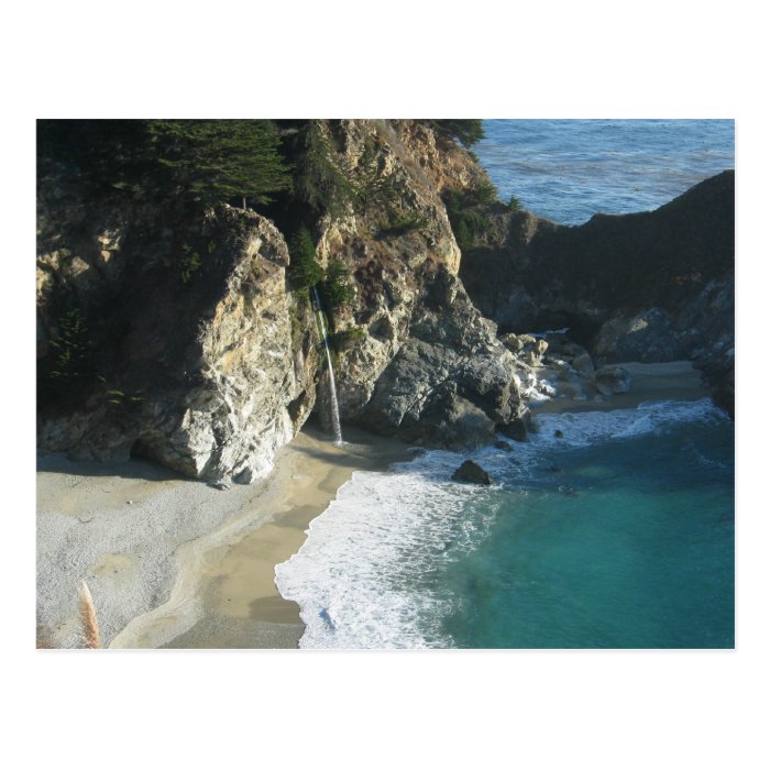 big sur waterfall onto beach