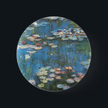 Waterlilies by Claude Monet, Vintage Impressionism Button<br><div class="desc">Waterlilies (1914) by Claude Monet is a vintage impressionist fine art nature painting. One of many variations of water lily floral paintings that Monet painted by the pond in his flower garden in Giverny, France. About the artist: Claude Monet (1840-1926) was a founder of the French impressionist painting movement with...</div>