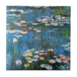 Waterlilies by Claude Monet, Vintage Impressionism Tile<br><div class="desc">Waterlilies (1914) by Claude Monet is a vintage impressionist fine art nature painting. One of many variations of water lily floral paintings that Monet painted by the pond in his flower garden in Giverny, France. About the artist: Claude Monet (1840-1926) was a founder of the French impressionist painting movement with...</div>
