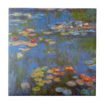 Waterlilies by Claude Monet, Vintage Nature Art Ceramic Tile<br><div class="desc">Waterlilies by Claude Monet is a vintage impressionism fine art nature painting featuring waterlily flowers in a pond in Monet's garden at his home in Giverny, France. Beautiful flowers are floating in the water and the reflection of green weeping willow trees. Claude Monet enjoyed painting "en plein air" or "in...</div>