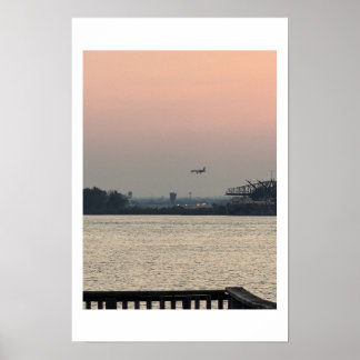 Waterscape Sunset with Airplane Poster