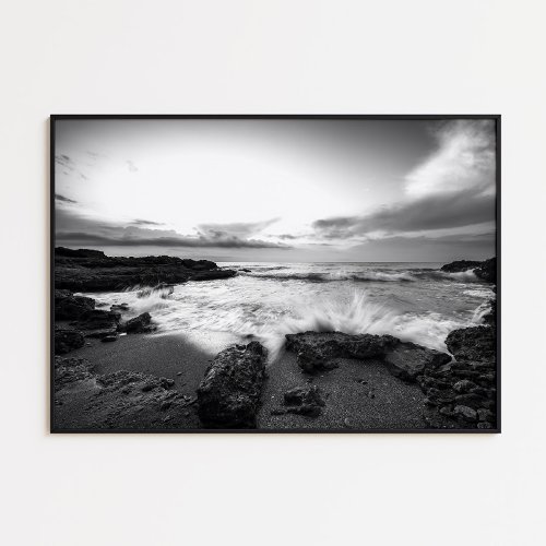 Wave crashing against rock black and white poster