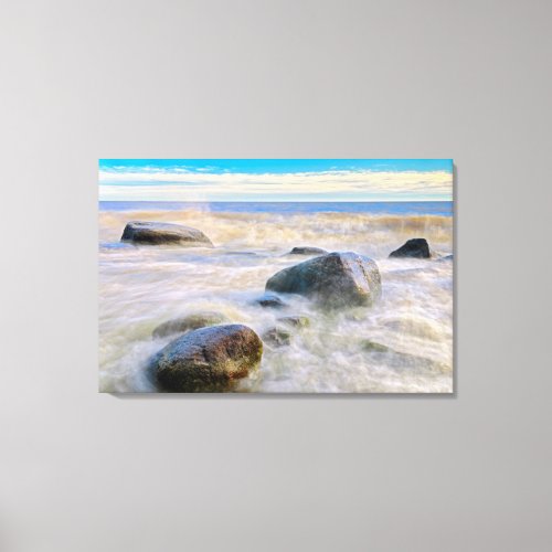 Waves crashing on shoreline rocks canvas print