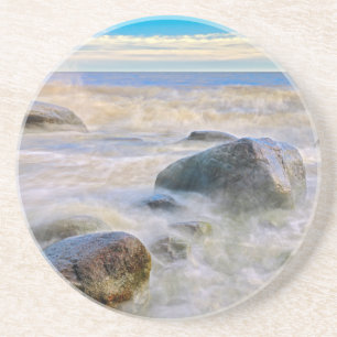 Waves crashing on shoreline rocks sandstone coaster