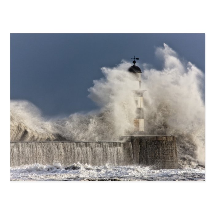 Waves Crashing Up Against A Lighthouse Post Card