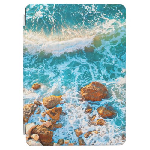 Waves on a rocky beach at sunset Aerial viewbeach iPad Air Cover