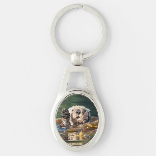 Waving Sea Otter Keychain