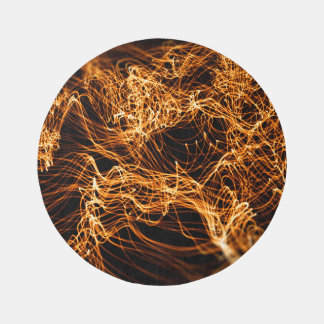 Wavy lines, round particles, string theory. rug