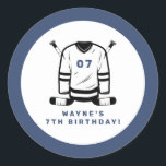WAYNE Hockey Player Sport Themed Boy Birthday Classic Round Sticker<br><div class="desc">This birthday birthday sticker features hockey themed sticks and jersey with a fun blue and white color combination. Pair with anything in the WAYNE Collection for a cohesive look.</div>