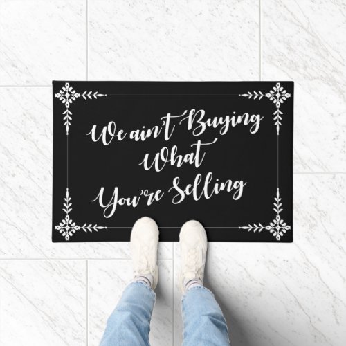 We aint buying it funny doormat