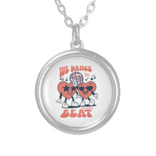 we dance to the same beat silver plated necklace