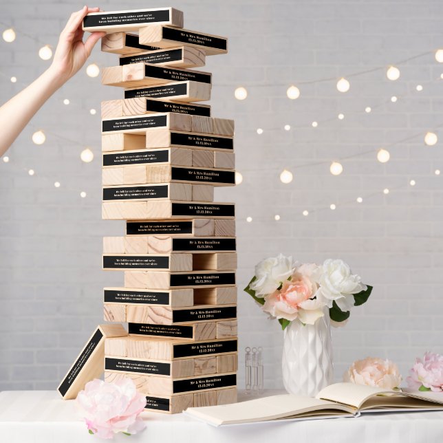 We fell for each other we are building memories topple tower (Wedding)