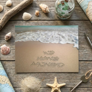 We have Moved Announcement Beach Sand Writing