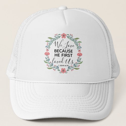 We Love Because He First Loved Us  Trucker Hat