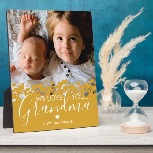 We Love You Grandma Keepsake Photo Plaque - Personalized grandmother photo plaque featuring a precious family photo, a mustard yellow heart border design, the saying "we love you grandma", and the childrens names.