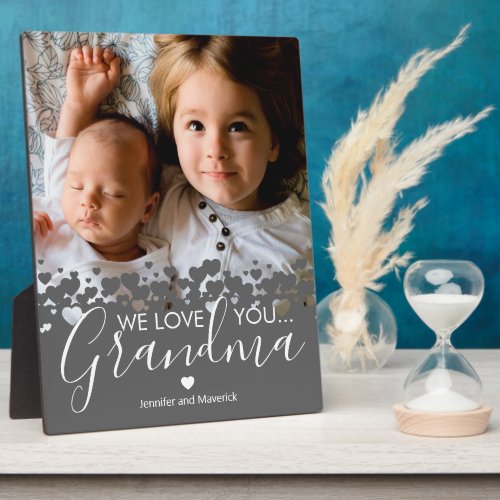 We Love You Grandma Photo Plaque - Personalized grandmother photo plaque featuring a precious family photo, a modern cute heart border design, the saying "we love you grandma", and the childrens names.