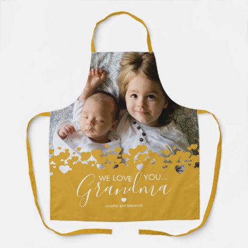 We Love You Grandma Photo Yellow Apron - Their is no better cook than grandma! Looking for a special gift for your grandmother, then this personalized mustard yellow apron is perfect featuring a precious family photo of the children, a trendy heart design, the saying "we love you grandma", and the grandchildrens names.