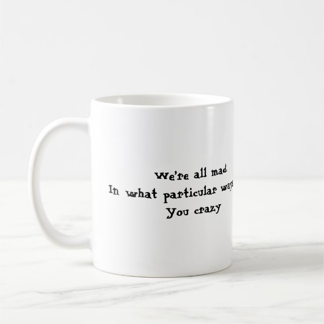We’re all mad coffee mug (Left)