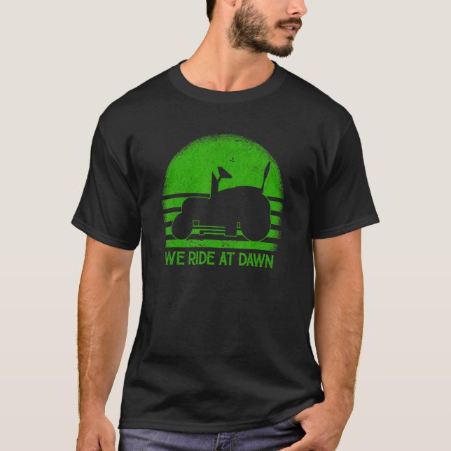 We Ride At Dawn  Sarcastic Lawn Mower Grass Cuttin T-Shirt (Front)