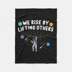 We Rise By Lifting Others Astronaut Sitive Motivat Fleece Blanket