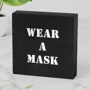 Wear a mask, black white wooden box sign