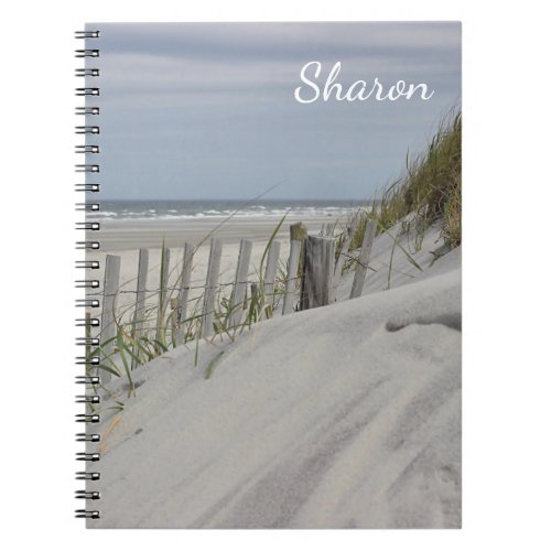 Weathered beach fence in the sand dunes notebook