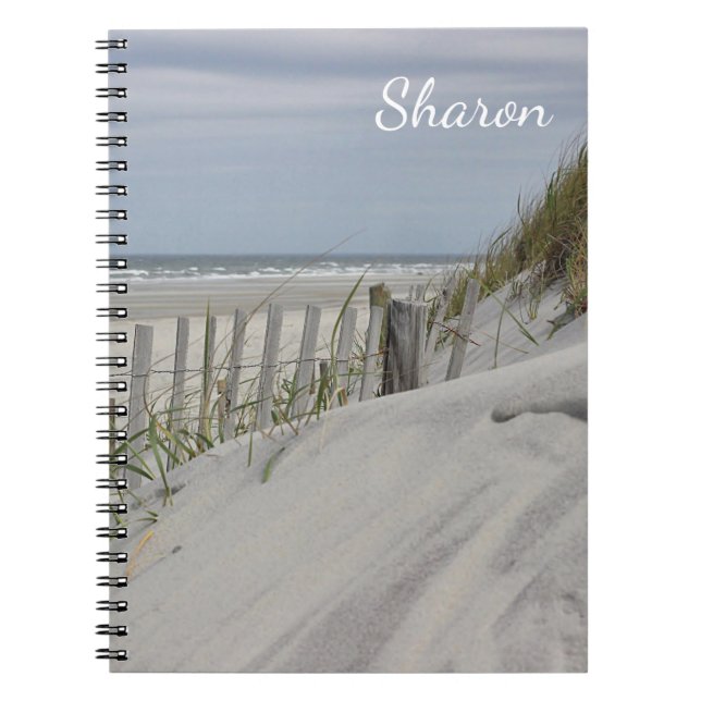 Weathered beach fence in the sand dunes notebook (Front)