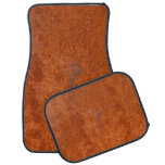Weathered rusted metal: orange-red texture. car floor mat