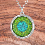 Weave Mandala Blue and Green Silver Plated Necklace<br><div class="desc">This funky mandala features green and blue in a patchwork,  woven thread style. Psychedelic visuals for the modern hippie or anyone who loves groovy colors.</div>