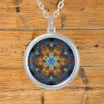 Weave Mandala Blue Yellow and Red Silver Plated Necklace<br><div class="desc">This funky mandala features blue,  yellow,  and red in a basket weave style. Psychedelic visuals for the modern hippie or anyone who loves groovy colors.</div>