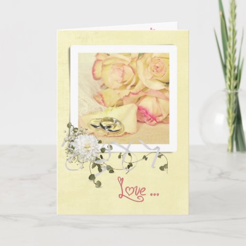 Wedding Anniversary rings on rose petal Card