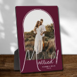 Wedding Arch Photo Burgundy Plaque<br><div class="desc">A special keepsake features your wedding photo in an elegant arch design with the text "Married" in chic text along with your names and wedding date on a burgundy background. Beautiful gift for your family and a fabulous memory to display in your own home. BACKGROUND color can be changed! MORE...</div>
