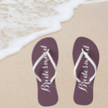 Wedding Bridesmaid Trendy Eggplant Flip Flops<br><div class="desc">Gift your wedding bridesmaids with these stylish bridesmaid flip flops that are a trendy,  eggplant color along with white,  stylized script to complement your similar wedding color scheme. Select foot size along with other options. You may customize your flip flops to change color to your desire.</div>