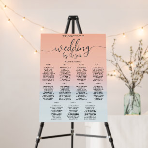 Wedding by the sea under peachy sky sunset foam board