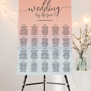 Wedding by the sea under peachy sky sunset foam board