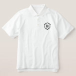 Wedding Crest Monogram Embroidered Men's Polo<br><div class="desc">Custom wedding crest embroidered men's polo shirt with personalized monogram. Perfect rehearsal dinner outfit, destination wedding attire, or bridal party gift with elegant crest design. Elevate your wedding celebration wardrobe with this sophisticated embroidered wedding crest women's polo shirt! Featuring a custom monogram elegantly framed within an ornate crest design, this...</div>