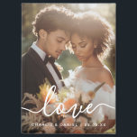 Wedding engagement photo love couples names date magnet<br><div class="desc">Fridge magnet featuring your custom photo with white text overlay “love” in an elegant script font and the names and date below.</div>