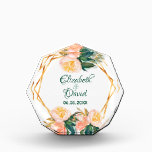 Wedding florals coral gold geometric roses acrylic award<br><div class="desc">A trendy award for a wedding. With a faux gold hexagon geometrical shaped frame. Decorated with watercolored dusty roses in white and Coral and green olive branches. Elegant white background. Templates for the bride and groom's names and the wedding date. The names are written with a hand lettered style script....</div>