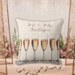 Wedding Gift Row of Pink Champagne Glasses Throw Pillow<br><div class="desc">A wedding pillow that is sure to wow the newlywed couple with a row of dazzling champagne glasses. Personalize it with the couple's name.
Makes a great bridal shower or wedding gift that will be treasured forever.</div>