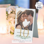 Wedding Greenery Gold 1 or 2 Photo Names Number Table Tent Sign<br><div class="desc">Wedding reception table number tent sign featuring one or two photos of the couple (one on each side) and their names with the table number in editable gold accented with watercolor greenery. The design is printed on both sides for two-sided viewing. CHANGES: The gold and black text font styles and...</div>
