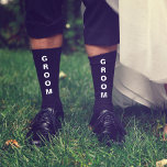 Wedding Groom Personalized Black Socks<br><div class="desc">Dress the men of your wedding party with coordinating black personalized socks. "Groom" is written down the front of the socks in bold white typography. Personalize these souvenir keepsake socks with your first names and wedding date in simple white typography.</div>