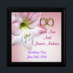 Wedding keepsake box<br><div class="desc">Wedding keepsake box with watercolor amaryllis flowers on canvas look background with names and date of the wedding couple. Perfect gift for bride and groom to save mementos from their special day. Customize with names and date. You can also change the font and the font color. This beautiful box can...</div>